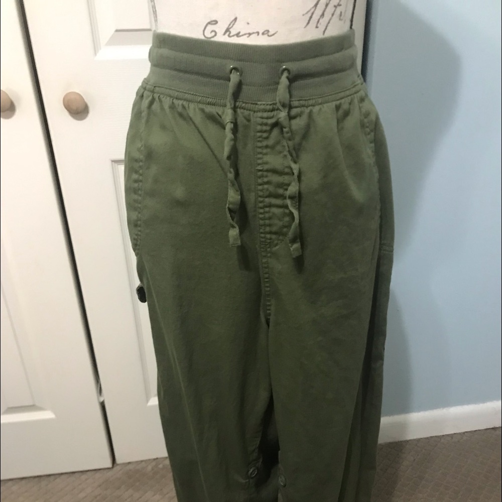 Woman within used capri convertible pants to Bermuda shorts.